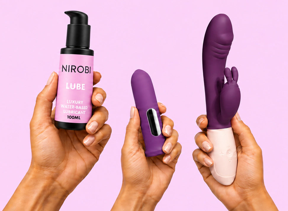 Three hands holding NIROBI water-based lube, a purple bullet vibrator and a purple rabbit vibrator against a pink background.
