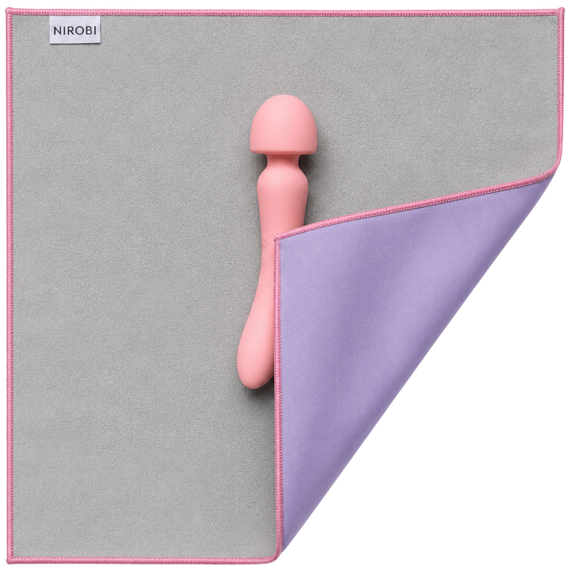 Lavender sex toy case and intimacy wrap with a pink intimate toy, soft grey lining and contrasting pink edging.